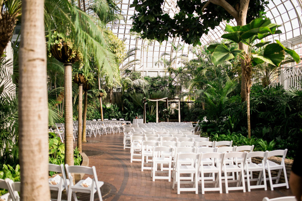 Wedding ceremony set up in the John F. Wolfe Palm House at the Franklin Park Conservatory in Columbus.