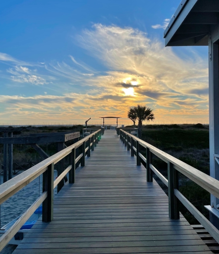 Carolina Yacht Club Venue pier side at sunset .